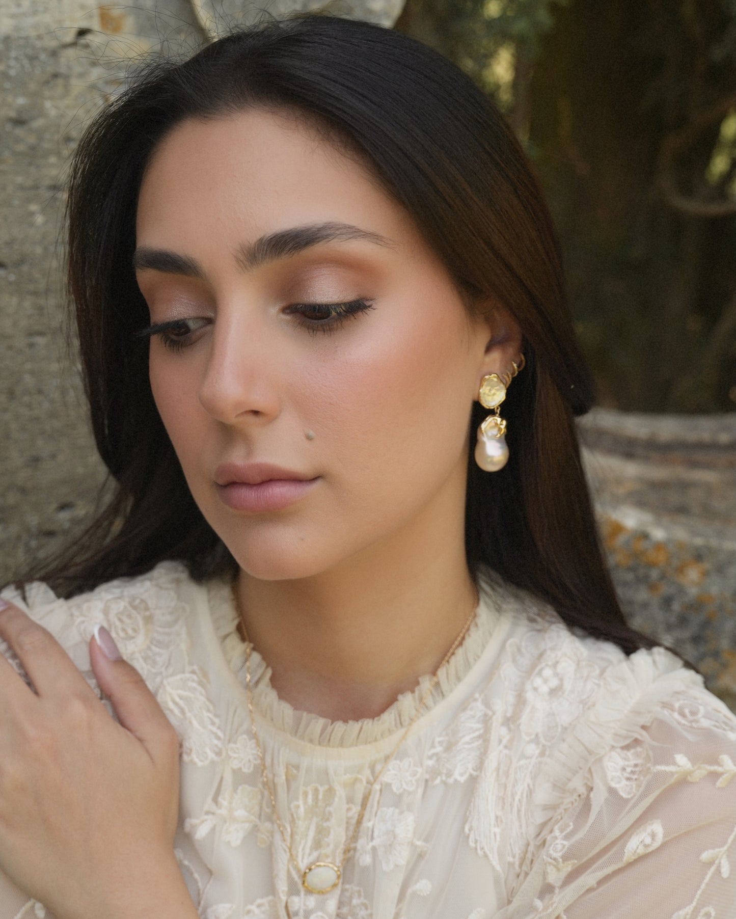 Model wearing House of Klara’s Odette Drop Earrings in soft natural light